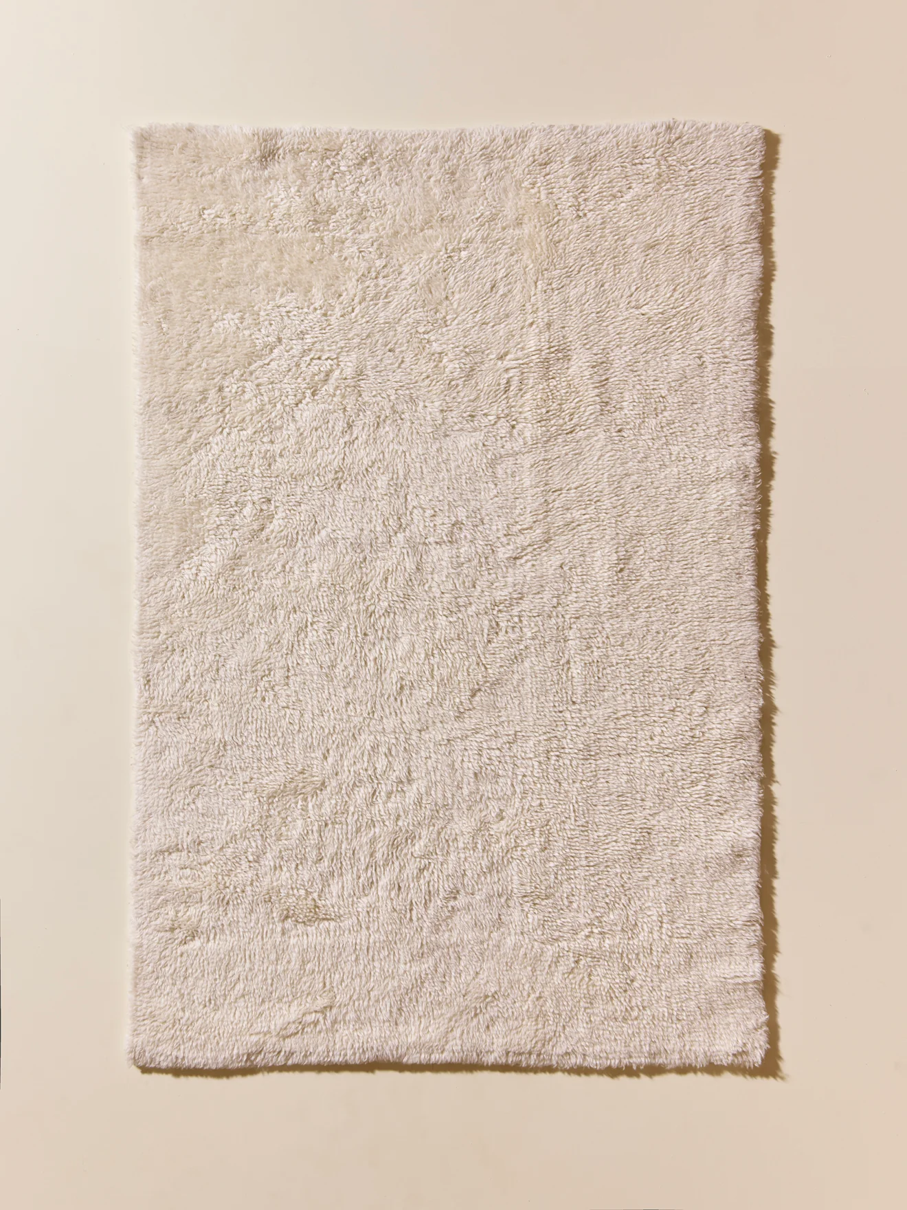 Petit tapis poils longs pure laine